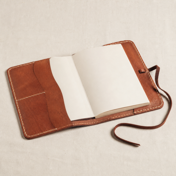 Close-up detail of Hand-Stitched Leather Journal Cover showing its natural leather with cotton thread stitching