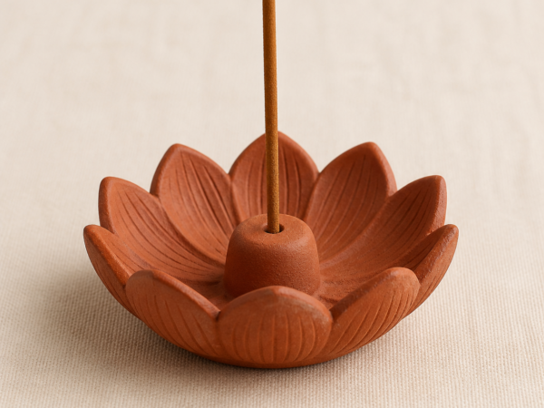 Terracotta Lotus Incense Holder on a warm neutral background