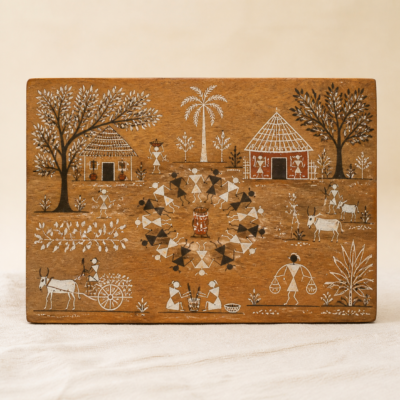 Warli-Inspired Village Scene Wooden Plaque - detail Close-up detail of Warli-Inspired Village Scene Wooden Plaque showing its wood plaque with hand-painted folk-art scene