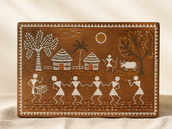 Warli-Inspired Village Scene Wooden Plaque - hero Warli-Inspired Village Scene Wooden Plaque on a warm neutral background